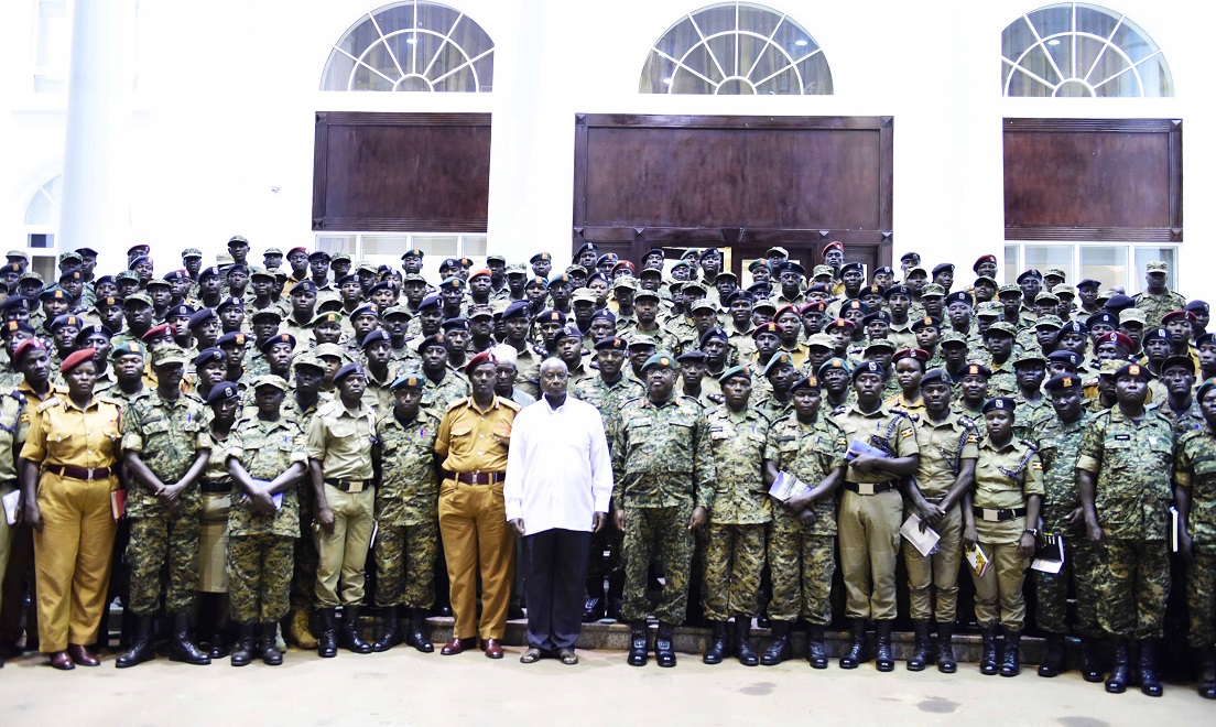 President Museveni in a group photo with students from Kyankwanzi at State House, Entebbe shortly after he delivered a lecture to them. On his left is Brig. Kasura, Comdt NALI. PPU PHOTO